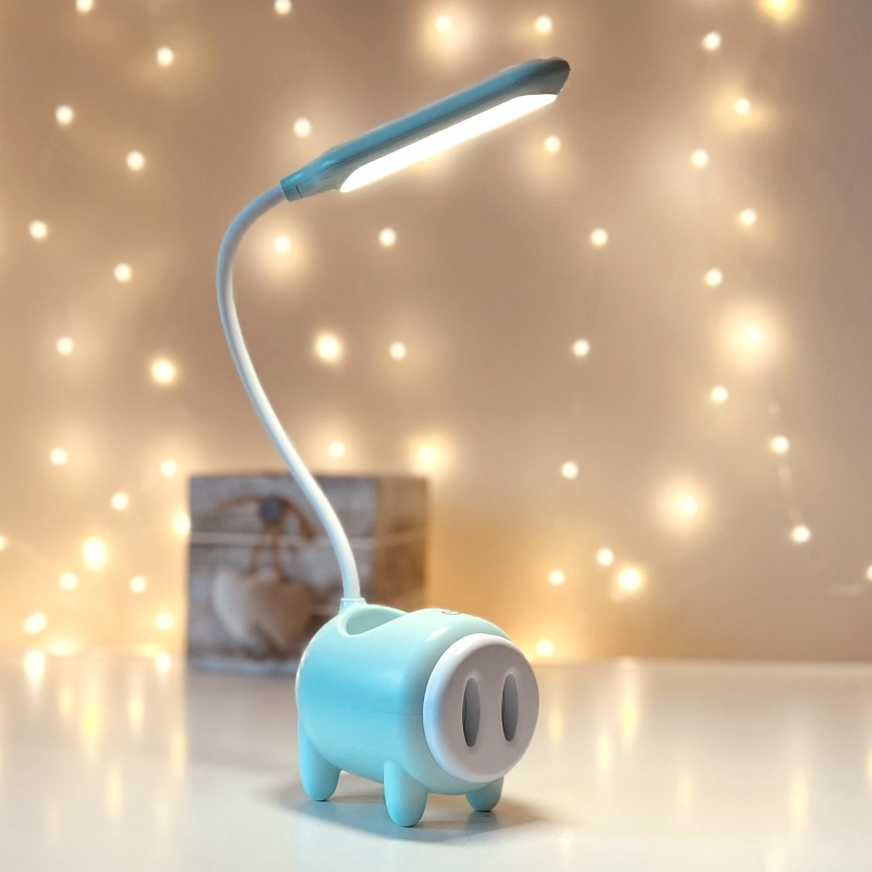 Lampka biurkowa TGX-788 LED, Lampka na biurko dla dzieci z pojemniczkiem na artykuły szkolne. Zmienna jasność oraz barwa światła. Ładowanie przez kabel micro USB.