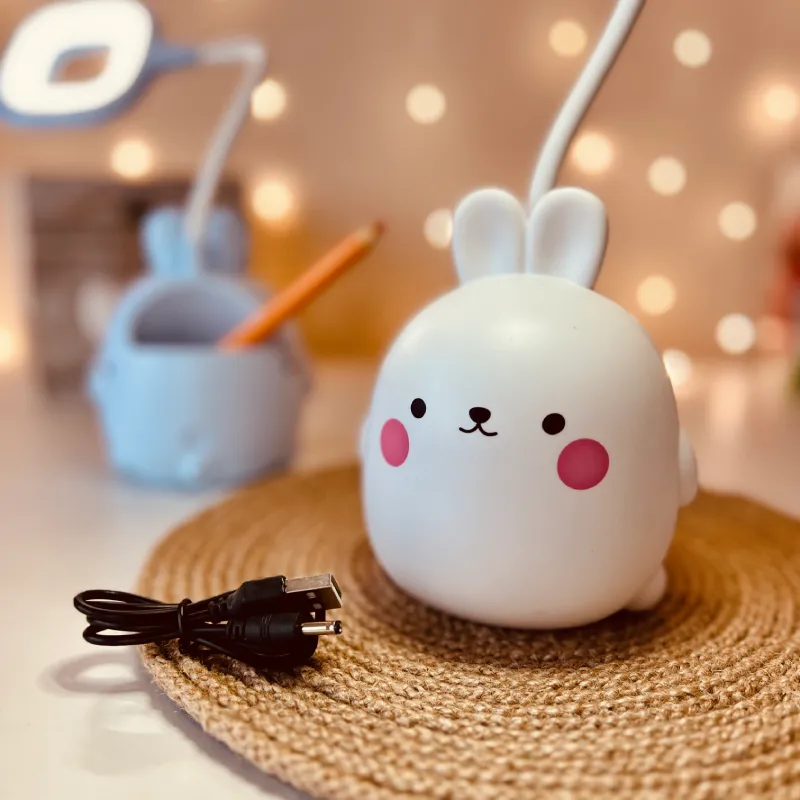 Lampka na biurko Królik LED, Lampka biurkowa dziecięca. 1 tryb jasności; delikatna barwa światła. Pojemniczek na artykuły szkolne