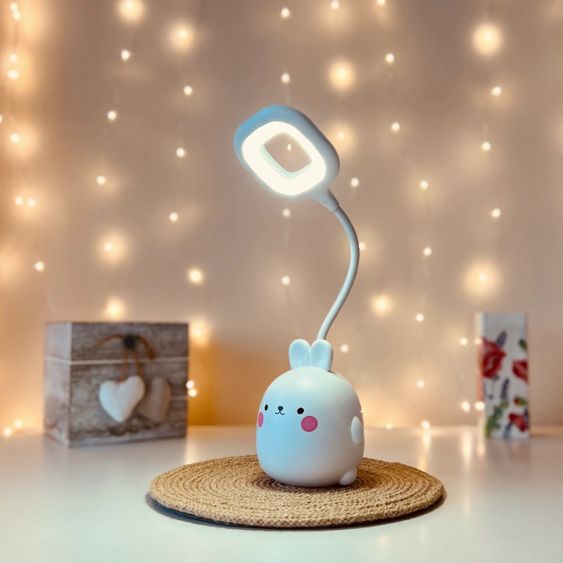 Lampka na biurko Królik LED, Lampka biurkowa dziecięca. 1 tryb jasności; delikatna barwa światła. Pojemniczek na artykuły szkolne
